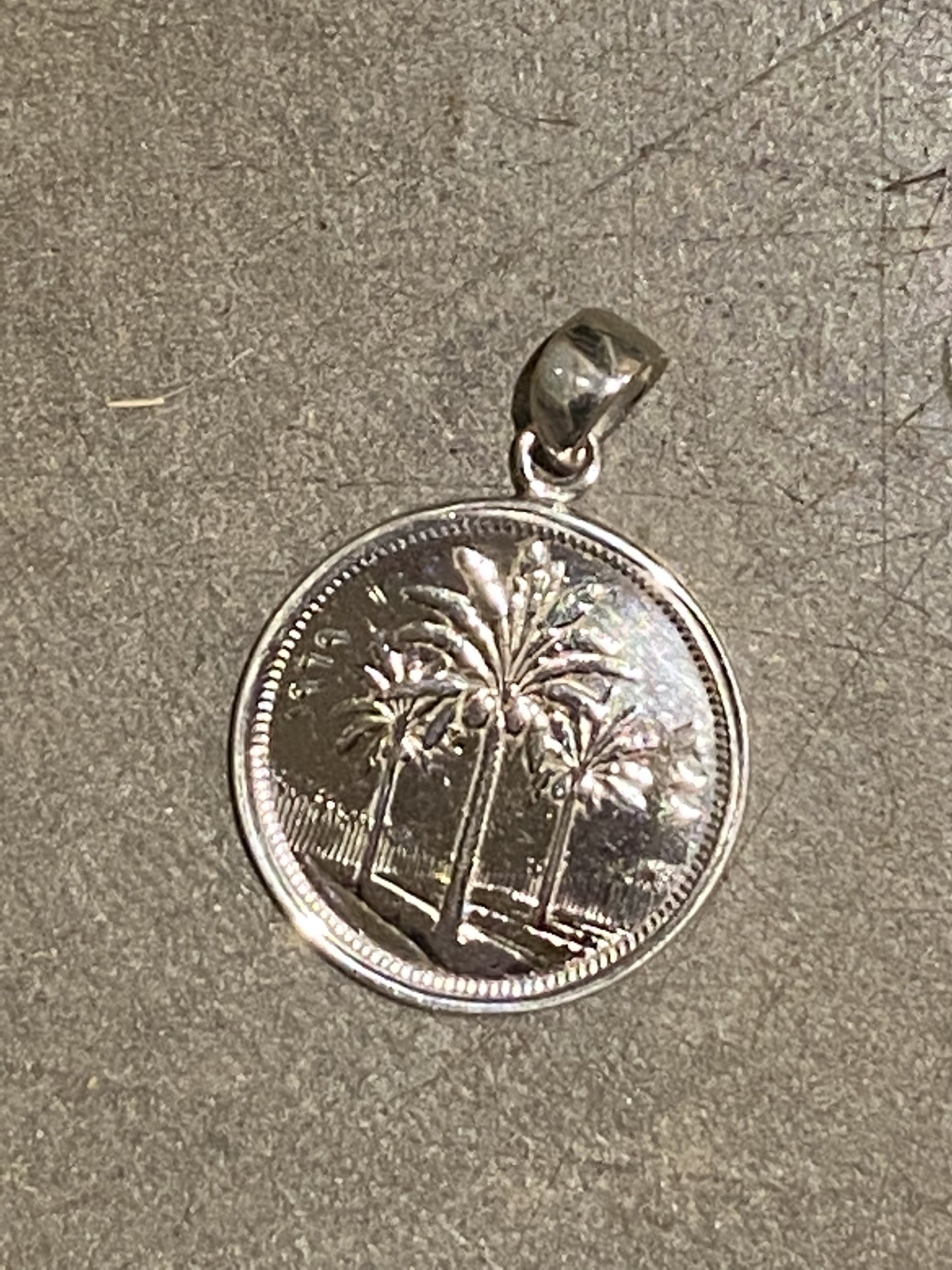 Palm Coin Pendant